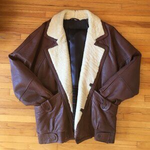 Leather jacket with genuine shearling collar